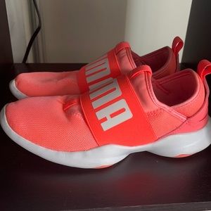 Puma pink/coral colored sneakers.Size 7.